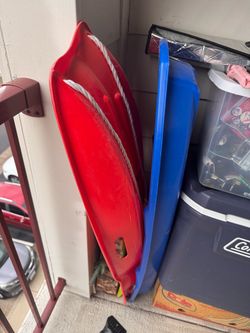 Plastic Snow Sleds Red and Blue