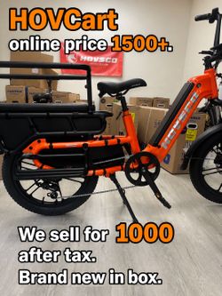 Grey and orange aluminum frame + torque sensor on family ebike - cargo electric bike