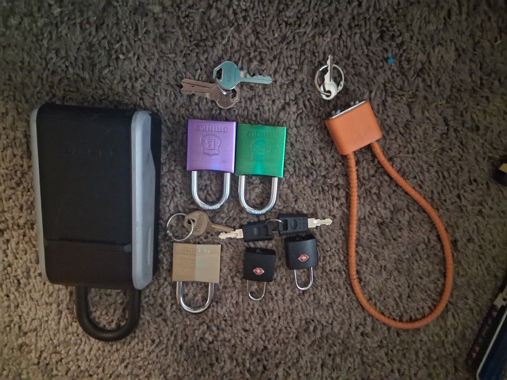 Assorted Key Locks, Gun/Trigger Locks And A Portable Combination Key Lock Box