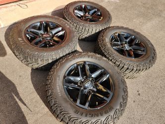 18" Chevy Silverado factory wheels and tires please read description before text