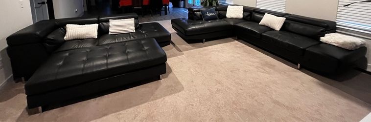 Modern 4-piece black leather corner sofa