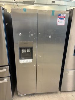 Never used Frigidaire 23 cubic Ft side by side refrigerator