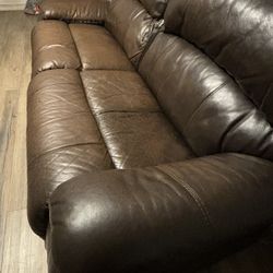 Leather couch, seats recline