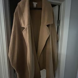 Woman’s Free People Coat. Camel Color