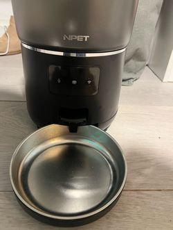 Automatic Cat or dog feeder (can use phone to set up feeding times)