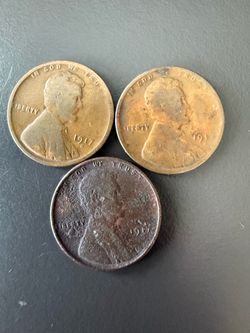 3 of the 1917 d Wheat pennies
