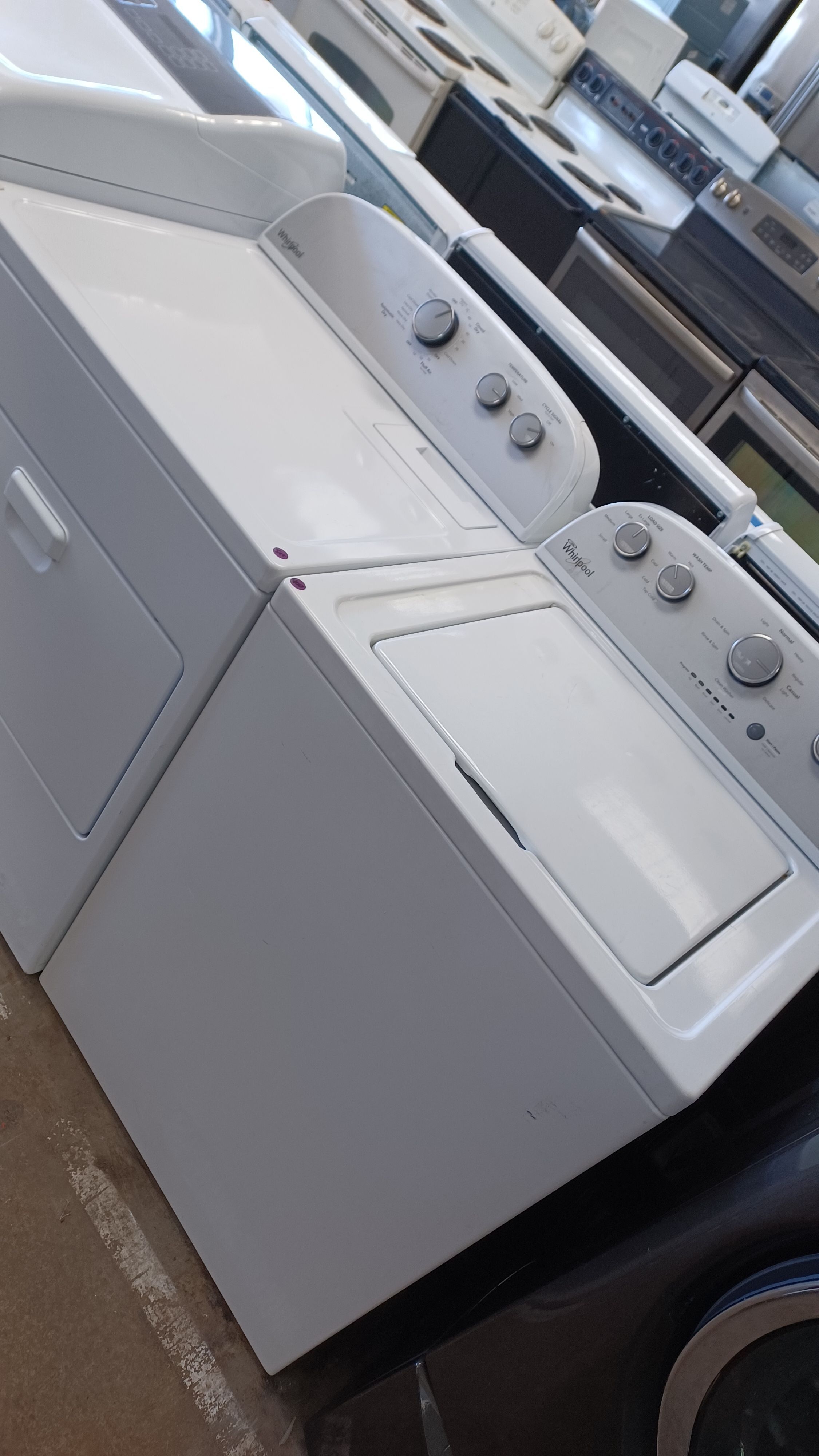 Whirlpool he top load washer and electric dryer set