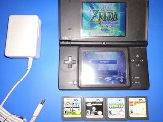 Nintendo Dsi console and 5 games