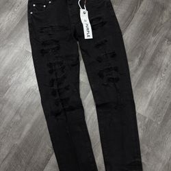 Black distressed jeans from Purple Brand  