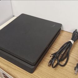 PS4, PS4 Charger, 2 PS4 Remotes And , 9 PS4 Games 