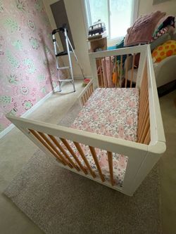 Convertible crib 52w x 39”d x 34.5”h