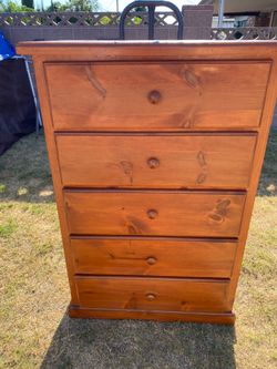 Used. Wooden dresser.