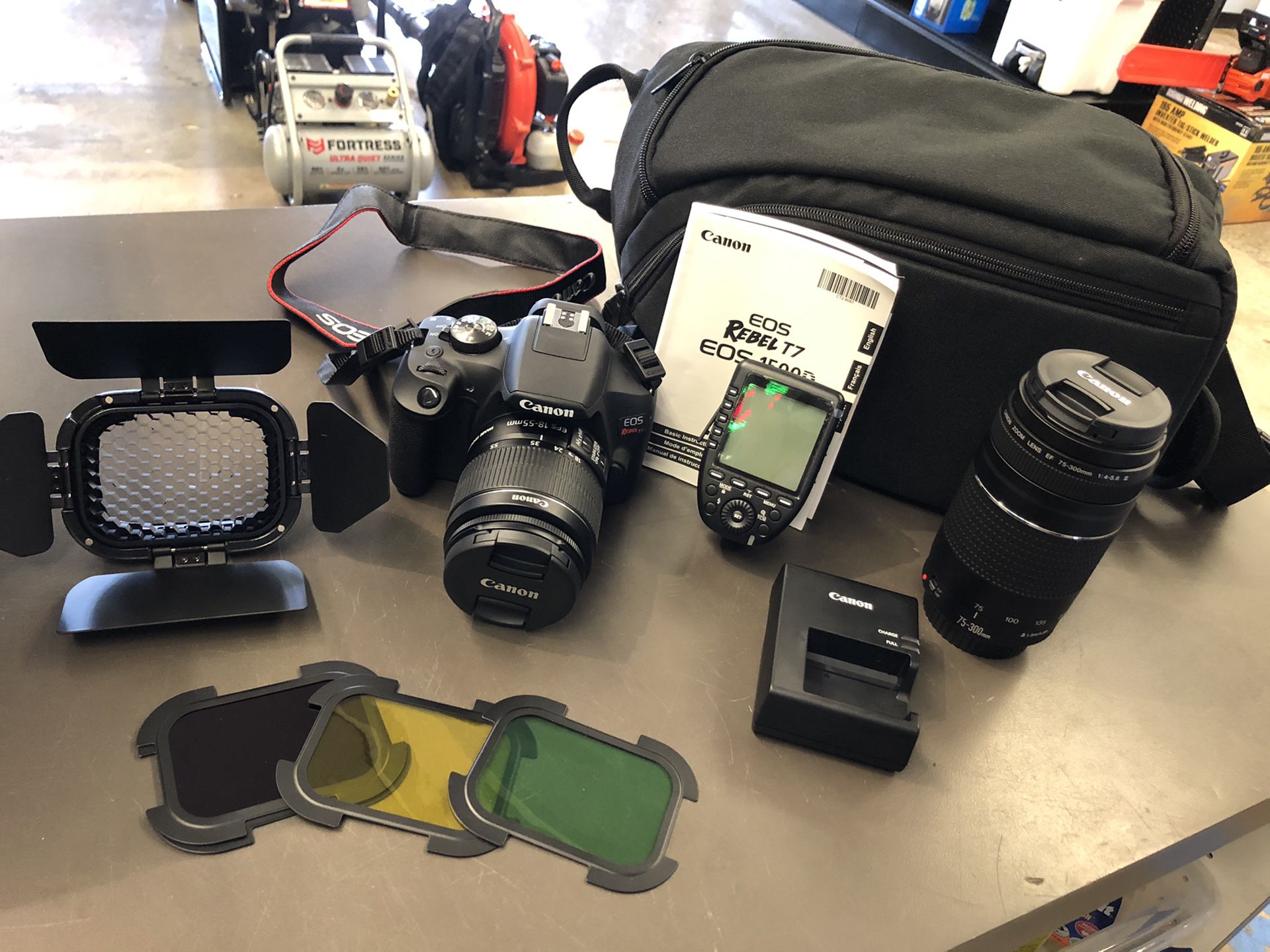 Canon EOS Rebel T7 camera with 18-55 mm Lens 75-300mm Lens godox barndoor and color filters Godox XProC TTL wireless flash battery charger and soft c
