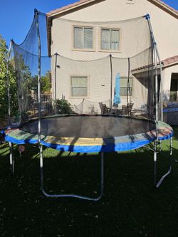 14 ft trampoline with safety net...$100
