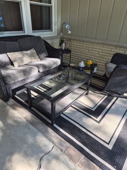Floyd Flanders patio set, coffee table and outdoor rug