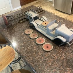 Antique 1920s Buddy L pressed fire truck ( person restoring passed away needs to be finished)