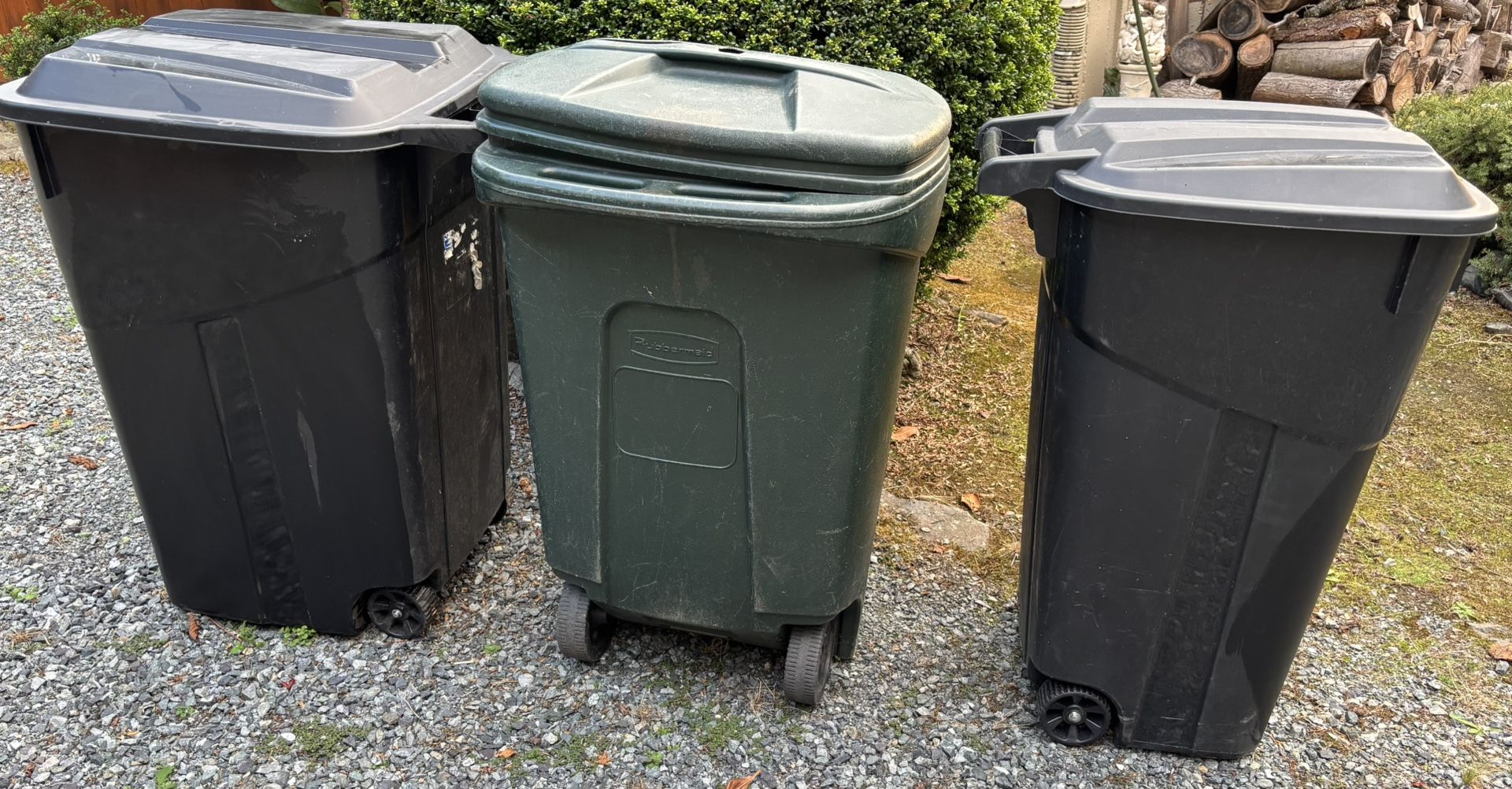 3 Wheeled Trash Bins With Lids. $15.00