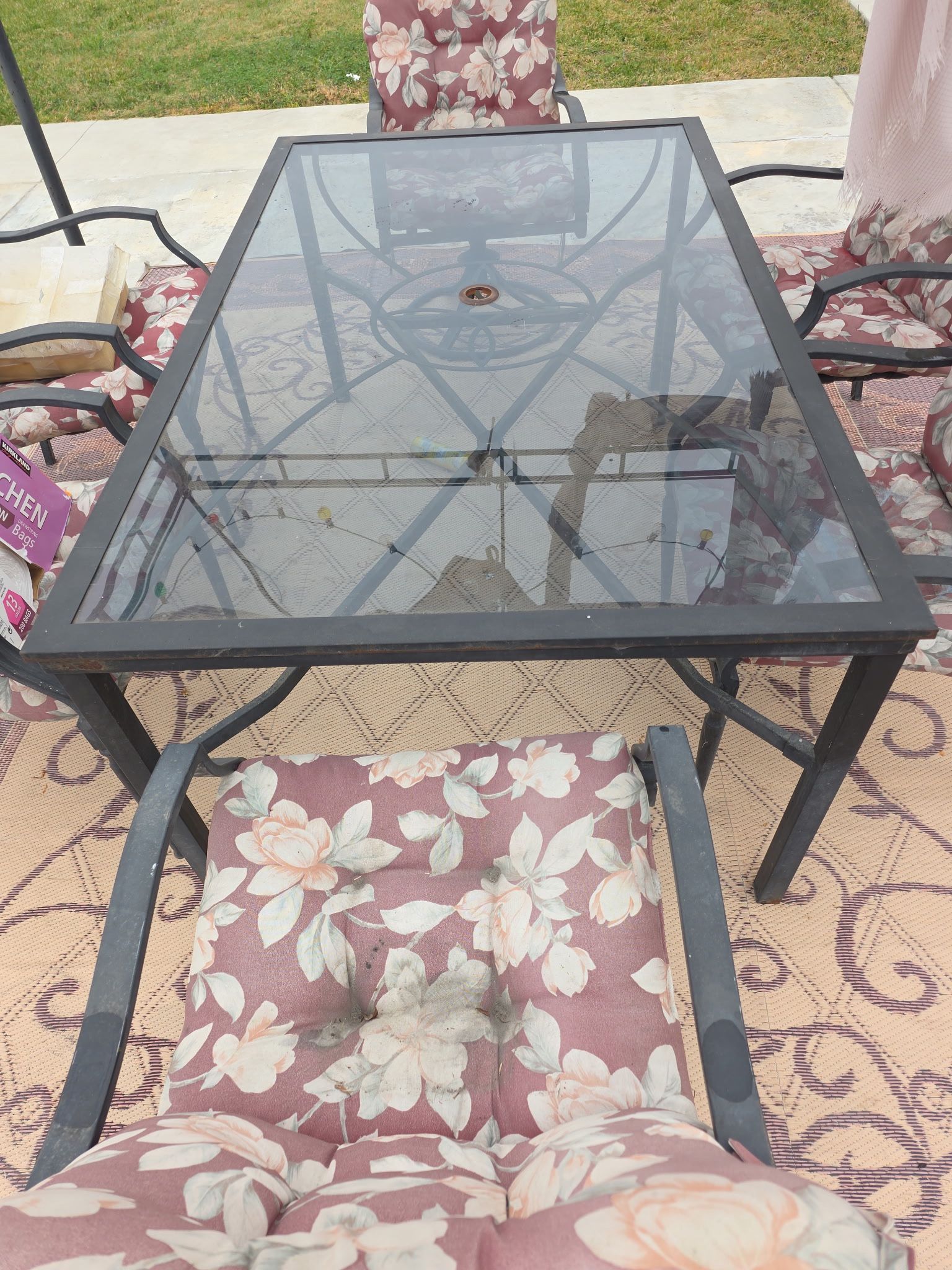 Glass and Wrought Iron Patio Table With 6 Chairs