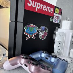 PS4 For Sale With 2 Controllers Baby Blue And Baby Pink