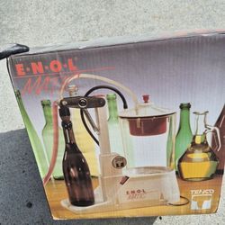 Enolmatic Wine Bottle Filler new condition.