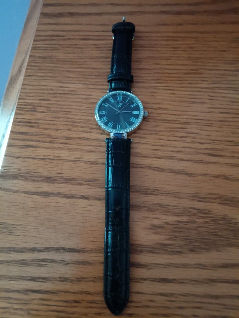 Gently Used Black Watch With Bling And A Leather Band