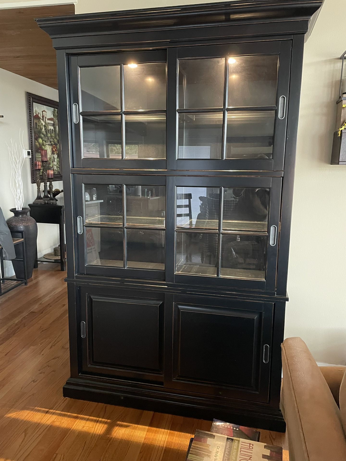 Black Hutch display cabinet located near Gladstone