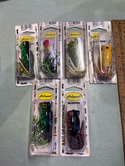 Lots of six vintage Arbogast hula popper fishing lures