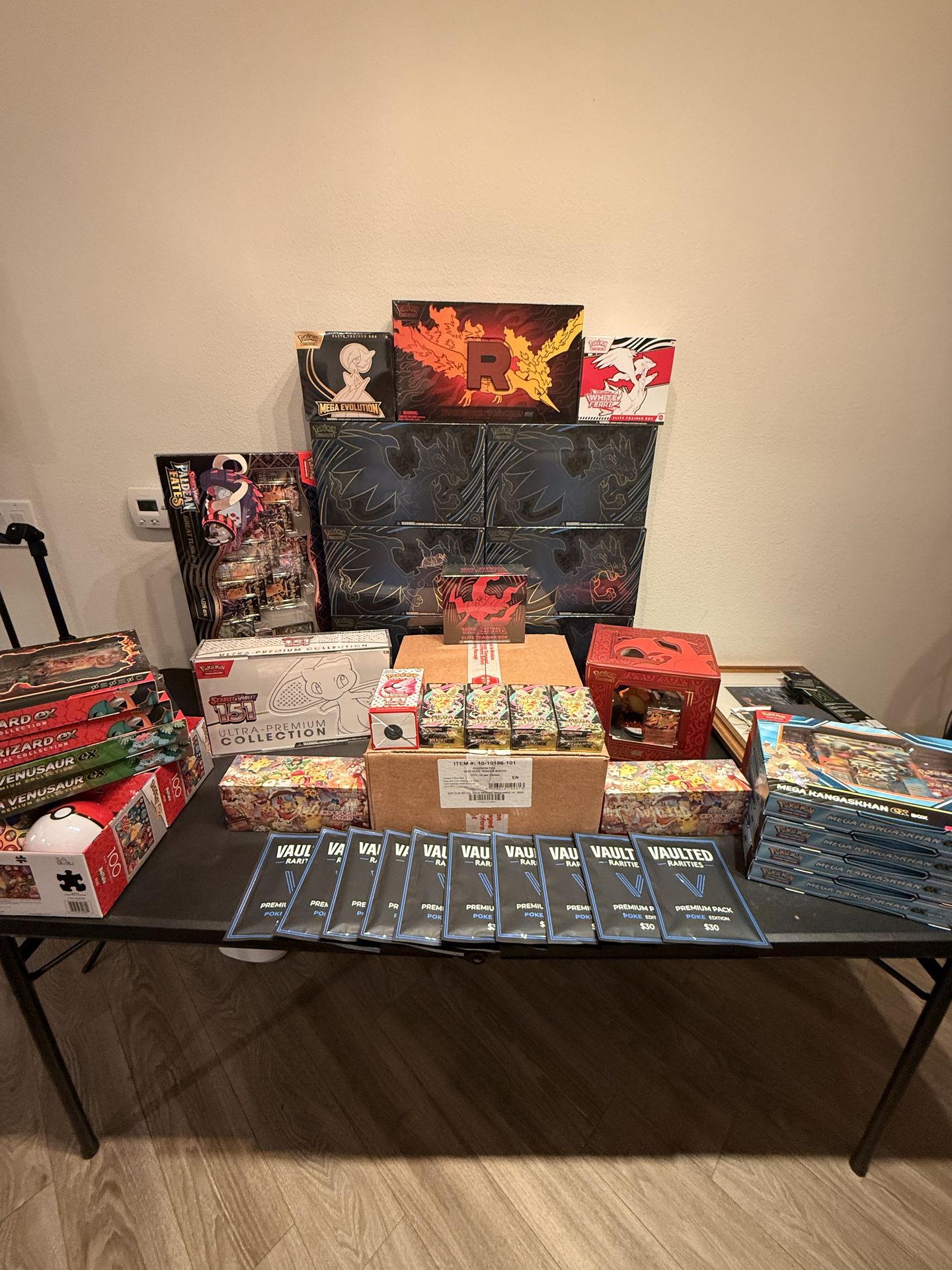 LOT of sealed collections of Pokemon