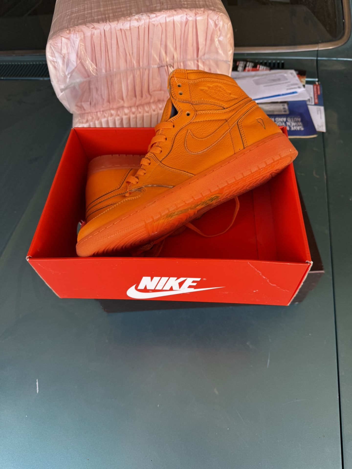 Orange Nike Jordan 1’s