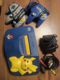Nintendo 64 Pikachu edition, all OEM cables, pokemon controller + extra controller