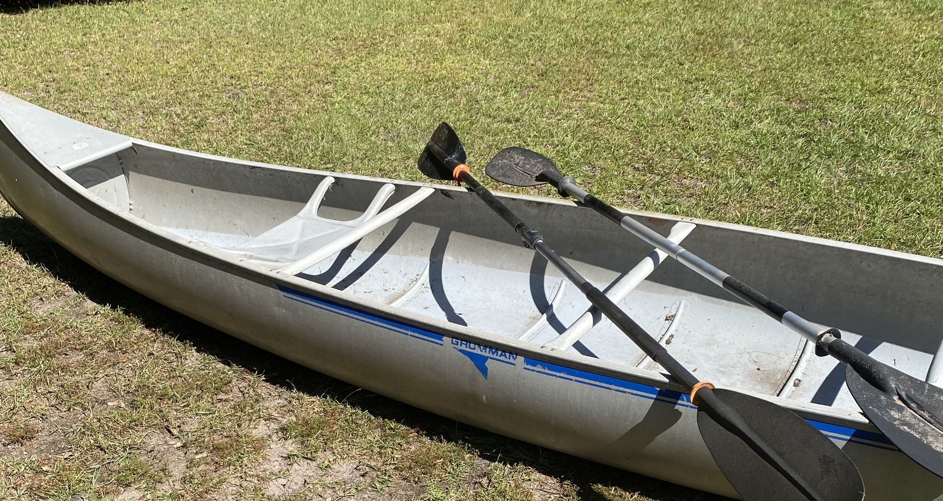 14 Foot Grumman All aluminum canoe With Paddles