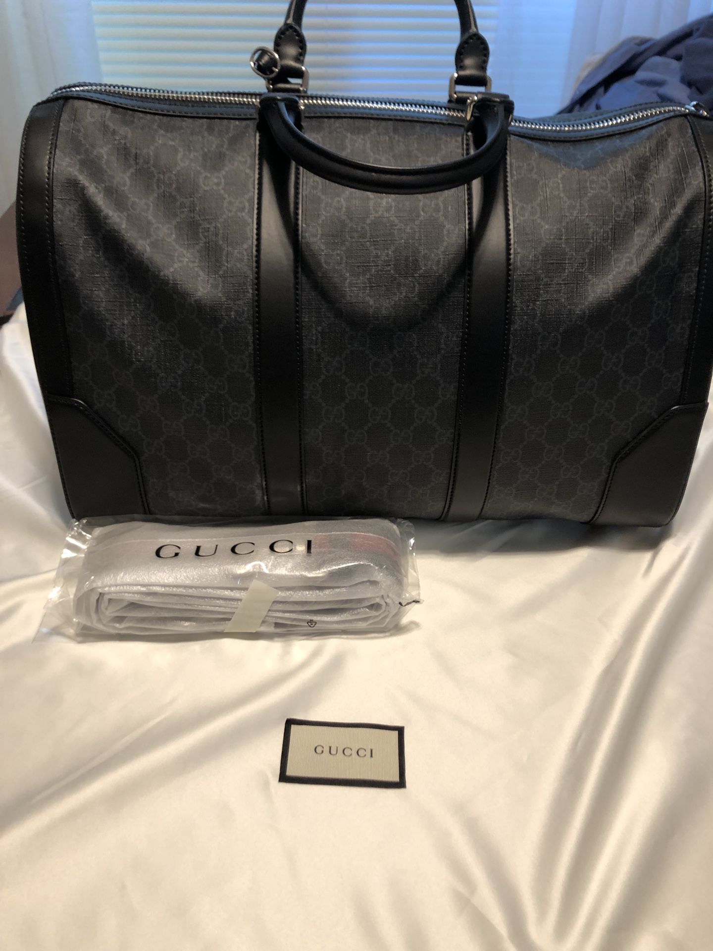 Gucci Supreme Duffle Bag