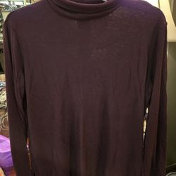 WT # 1076 WOMEN'S SMALL, JONES, NEW YORK TURTLENECK.
LONG SLEEVE WITH SIDE SLITS