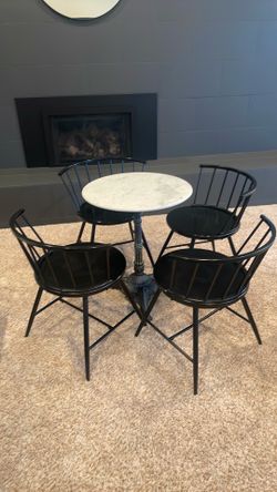 4 black chairs