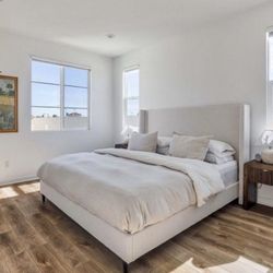 King Upholstered Wingback Bed