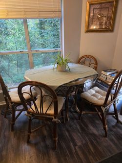 Round glass table with 4 chairs