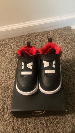 Red ,black and white Jordan size 7c