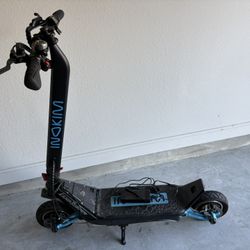 INOKIM OXO Electric Scooter Like  Brand new 