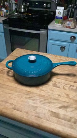 Teal Crockpot brand enameled cast iron skillet Dutch oven