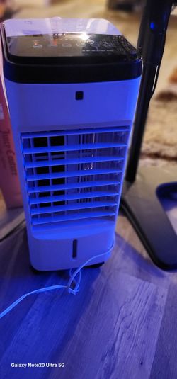 Nice 24" tall air conditioner. Add water and freeze water bottles. It's nice also Comes With remote