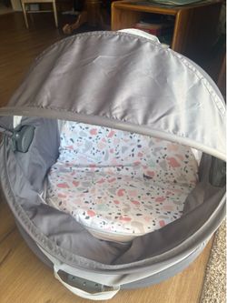 portable baby bassinet or infant lounger/travel bed.