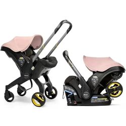 Pink Doona Car Seat And Stroller 