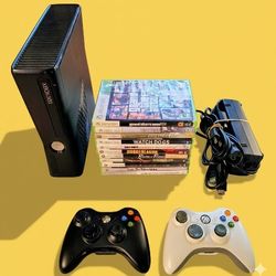 Microsoft Xbox 360  slim with 2 controllers 11 games power supply HDMI 