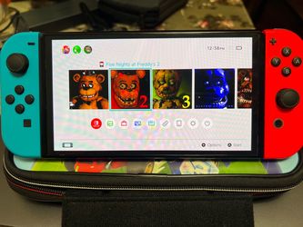 Nintendo Switch Oled w/ game