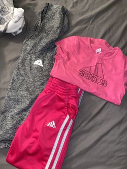 Adidas size 6 lot small stain on pink shirt shown