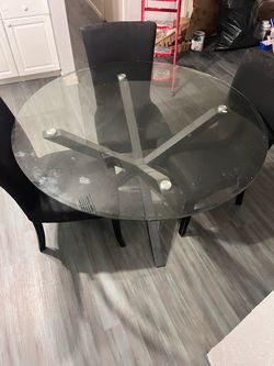 54” Round Glass Dining Table with 3 Black Chairs