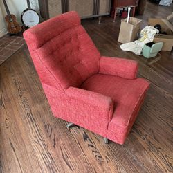 Upholstered mid century rocking chair