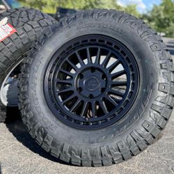 22” OE Black GMC Denali AT4 Sierra 2500 rims 35” all terrain tires Chevrolet Silverado 8x180 wheels