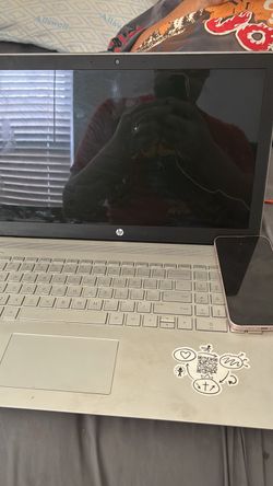 that is locked and a laptop needs charger, but it works good HP Laptop Silver 15-inch iPhone 13 that is locked and a laptop needs charger, but it work