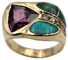 14k Yellow Gold custom Rubellite and opal ring.